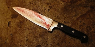 Вбивці, який зарізав чоловіка за пляшку горілки, «дали» 14 років тюрми