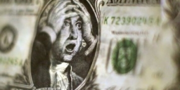 Долар зросте на дві гривні