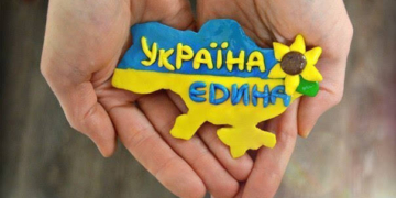 нація